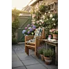 Set van vier gestapelde teak houten tuinstoelen met armleuning in een sfeervolle Nederlandse tuin met hortensia's en rozen, VT Wonen stijl terras.