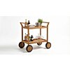 Teakea Nomad serveerwagen met minimalistisch teakhouten frame en grote wielen, witte achtergrond