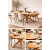 Ovale houten eettafel met matrixpoot in een Scandinavisch interieur met beige eetkamerstoelen en gedekte tafel.